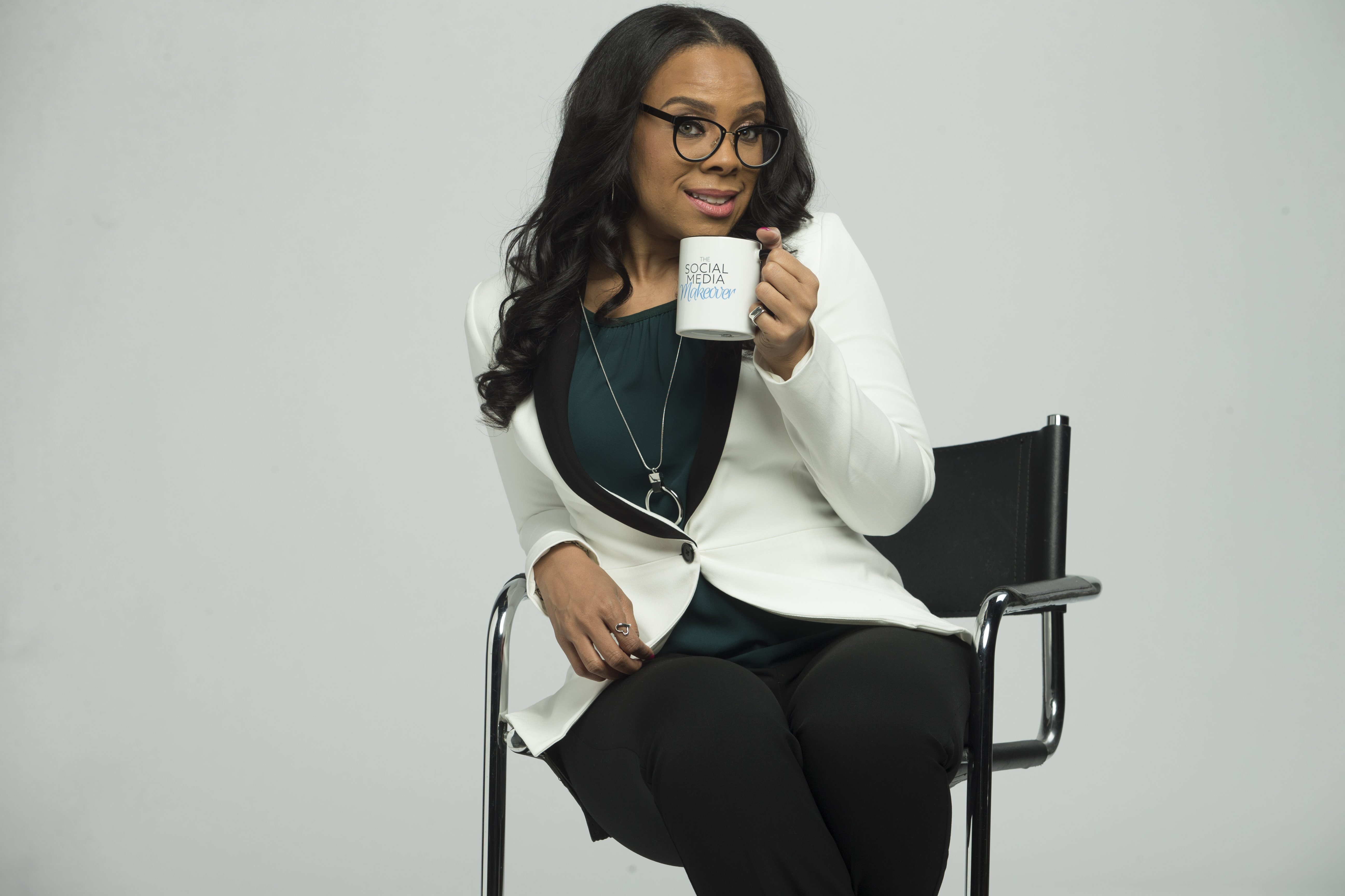 Tisha Holman sitting a chair